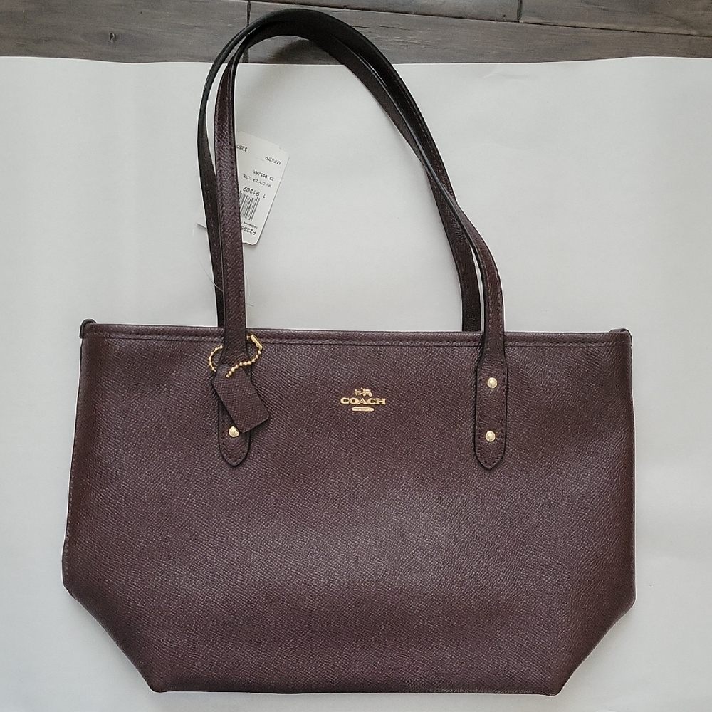 Coach Brown Leather Tote with Gold Logo and Structured Design